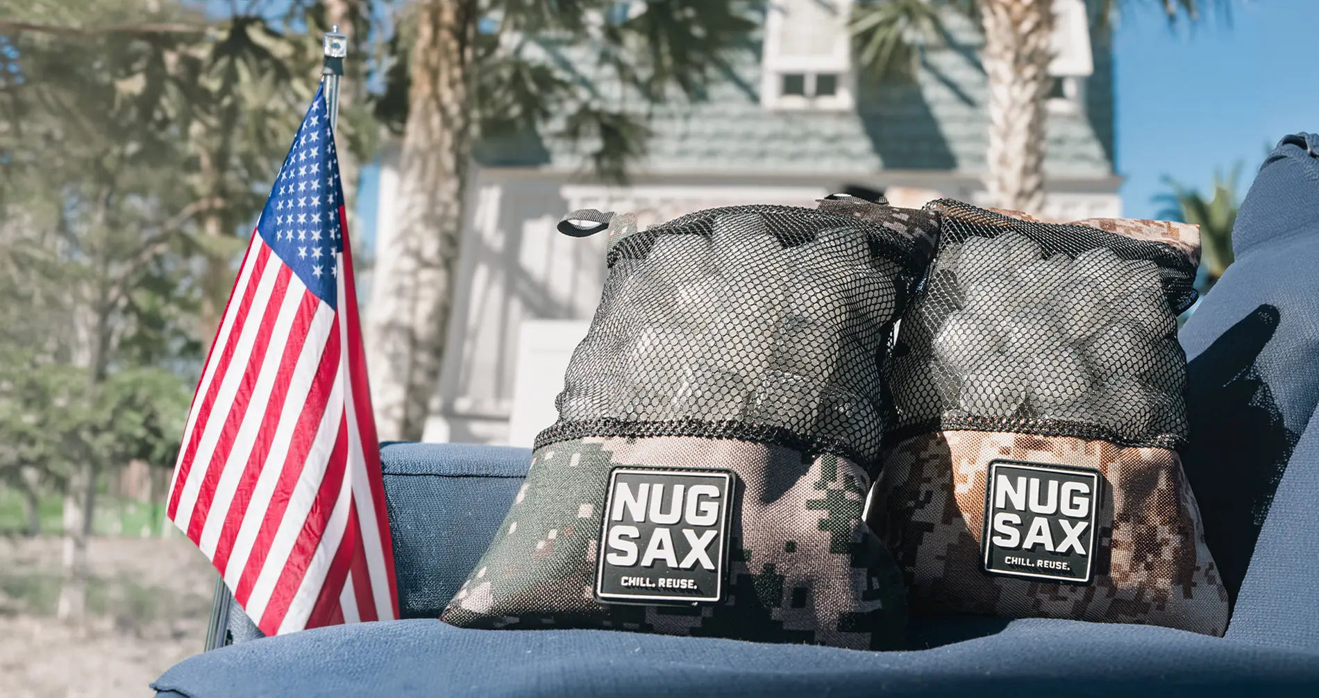 Two nugsax bags on a blue surface with an American flag in the background.